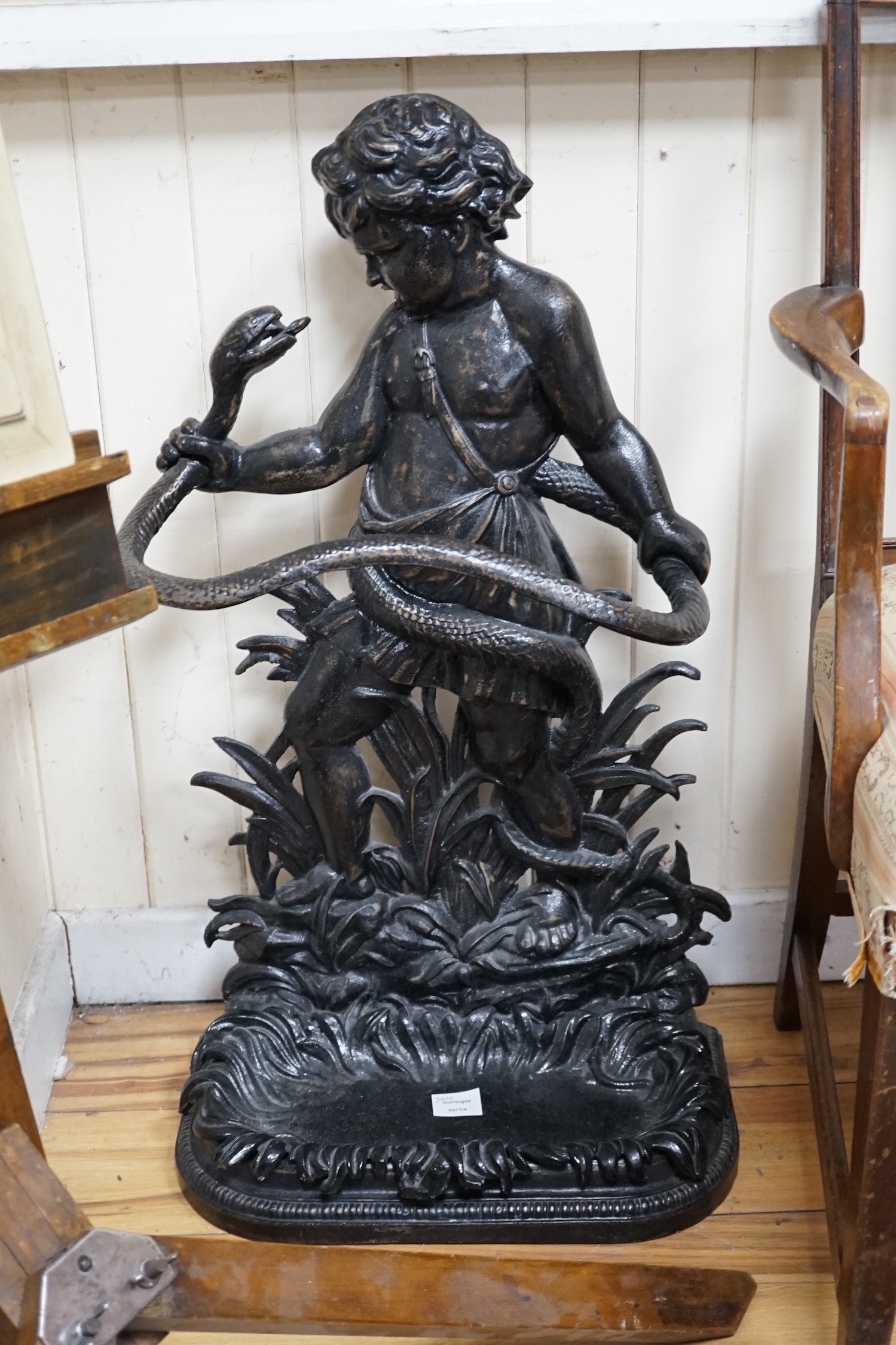 A Victorian style black painted cast iron infant Hercules stick stand in the Coalbrookdale style, height 82cm *Please note the sale commences at 9am.